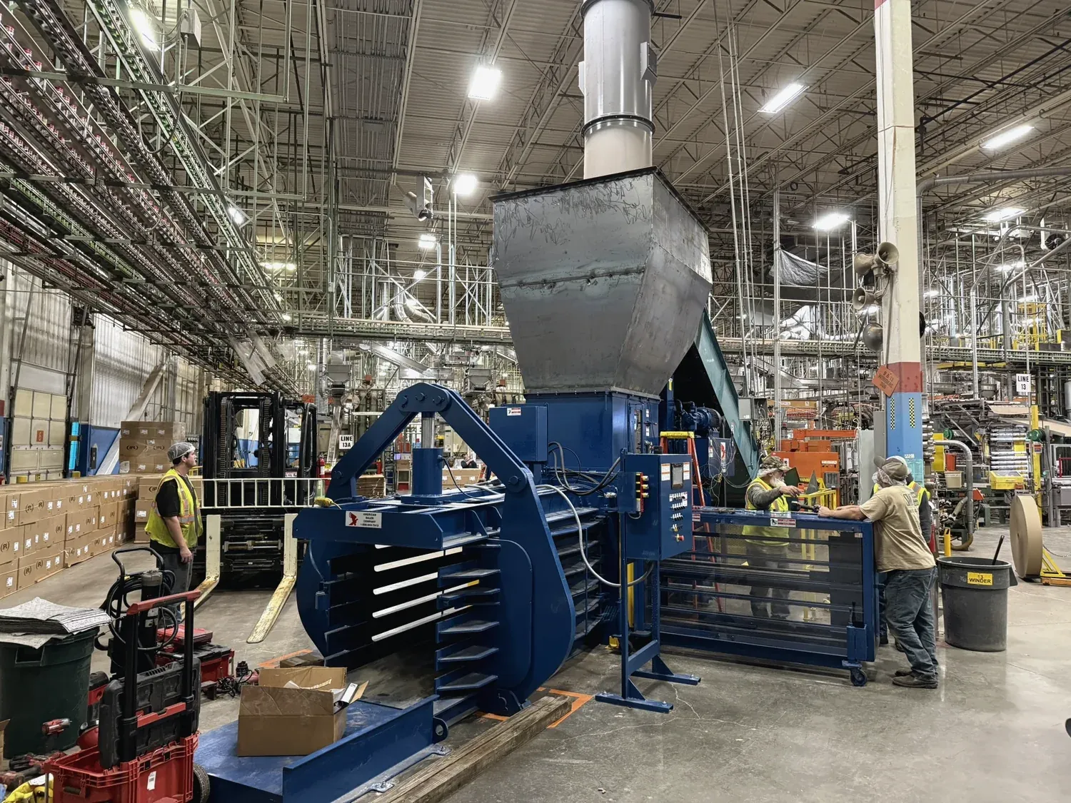 Norton crew servicing a baling line